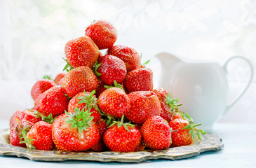 Fresh red strawberry for dessert on the kitchen table