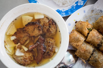 Bun cha, grilled pork rice noodles and herbs, vietnamese cuisine. Us President, Obama used to try this food in Ha Noi when visiting Vietnamese Capital in 2016.