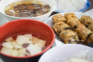 Bun cha, grilled pork rice noodles and herbs, vietnamese cuisine. Us President, Obama used to try this food in Ha Noi when visiting Vietnamese Capital in 2016.