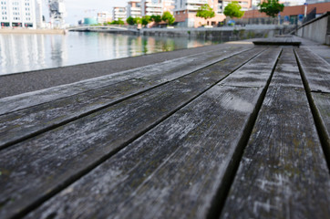 Wooden bench on the quay in Strasbourg