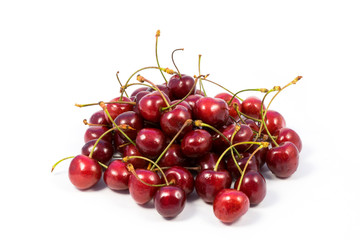 Small heap of ripe sweet cherry isolated on white background