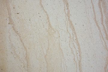 Finely textured worn veined marble travertine stone background
