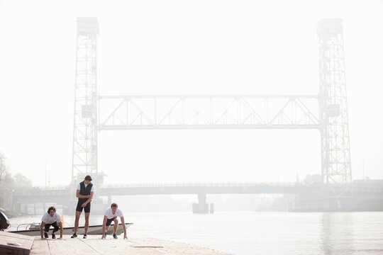 Men preparing to run