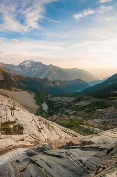 Glacier pond below the glacier eroded cliffs near the MacBeth Icefields, Purcell Mountains, Kootenay Region, British Columbia, Canada