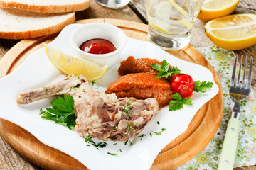 Boiled rabbit with vegetables garnish