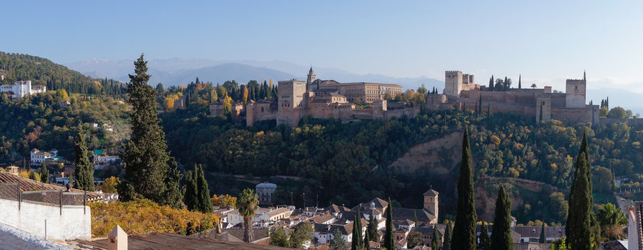 Alhambra Palace in Granada, Spain. Sierra Nevada mountains at the background