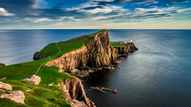 Beautiful sunset at Neist point lighthouse, Scotland, United Kingdom, 4k, timelapse