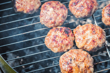 burgers on the grill, barbecue burgers Camping