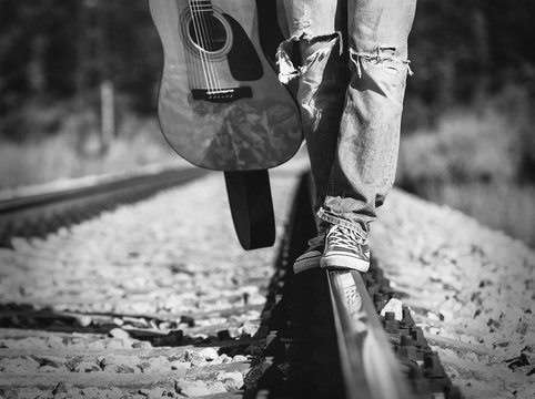 Close up image man legs on the railway