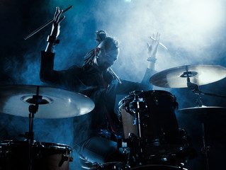 Fototapeta premium Silhouette of the drummer on stage.