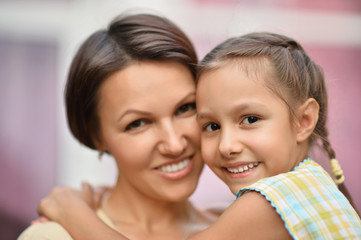 girl with mother in park