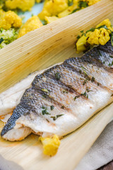 grilled seabass served with vegetable cous cous