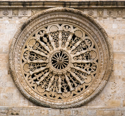 beautiful stone rose window Cathedral of Acquaviva, one of the most beautiful villages in Italy. Puglia - Italy