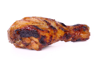Grilled chicken leg on white background.
