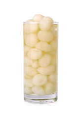 Longan syrup in glass  on white  background