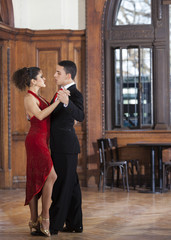 Dancers Performing On Hardwood Floor In Restaurant
