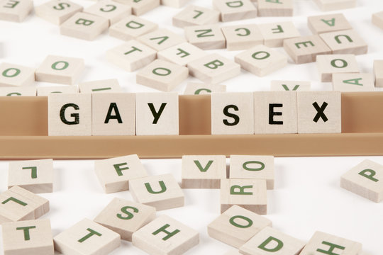 Gay Sex - Diritti gay, lesbiche e trans scritti con tessere di legno. 