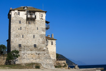 Fototapeta na wymiar Ancient Ouranoupolis Tower on Athos peninsula in Halkidiki, Gree