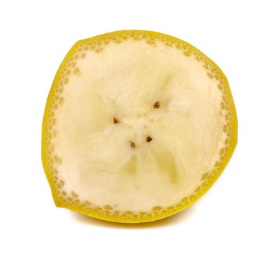 close up of banana fruit slice isolated white background