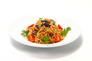 pilaf with dried plums and tomatoes