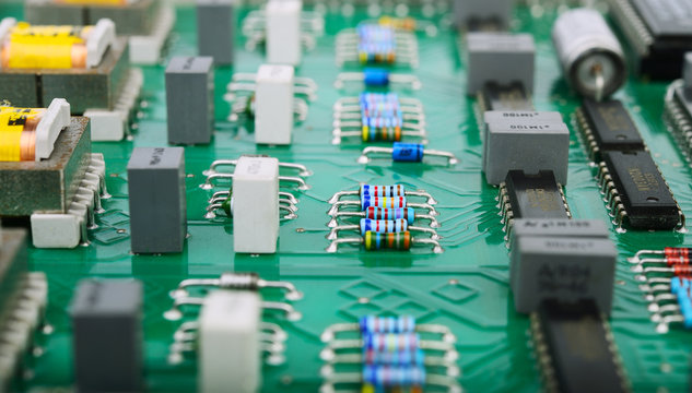 Detail of an electronic printed circuit board with many electric