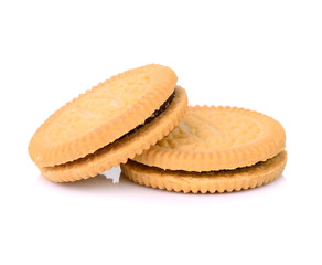 sandwich cookies with cream on white background