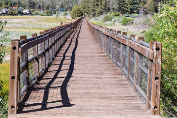 Wooden walkway over dried lake bed