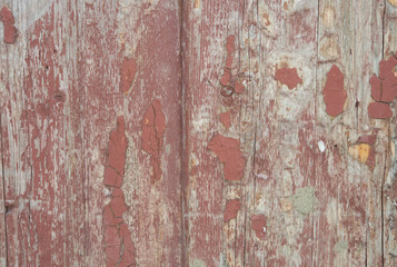 Красный старый деревянный забор. Старые деревянные доски красная краска