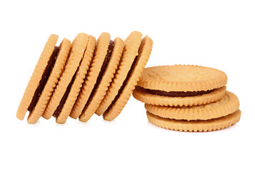 sandwich cookies with cream on white background