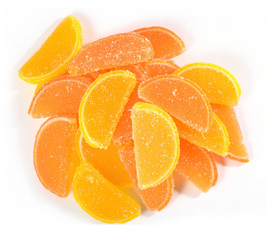 Naklejka na ściany i meble Heap of orange and lemon candy slices on a white