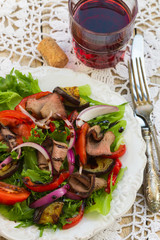 Warm salad of roast beef and vegetables - roasted bell peppers, eggplant, fresh tomatoes, red onion and lettuce with balsamic dressing
