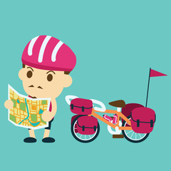 cyclist using a map and a bicycle touring