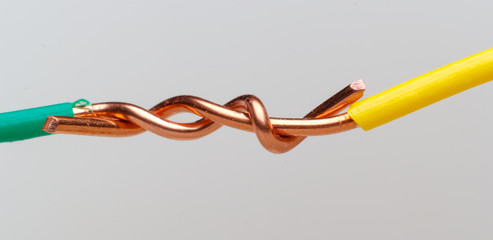 close up of connected, joined electric wires against