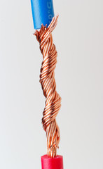 close up of connected, joined electric wires against