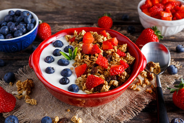 Homemade granola Breakfast with yogurt and fresh fruit berries. concepts health food