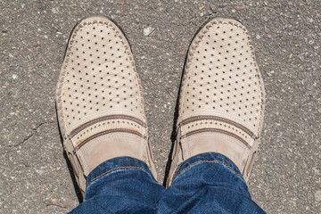 Moccasins on his feet