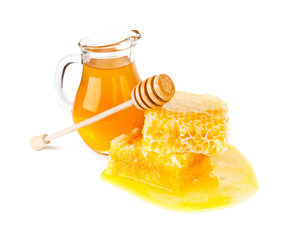 Fresh honey with honeycomb on whie background 