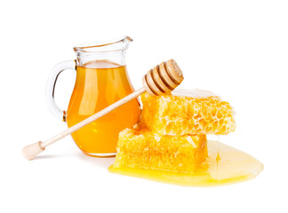Fresh honey with honeycomb on whie background 