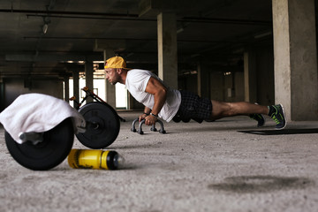 Guy in the baseball cap doing strength training