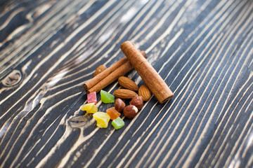 Nuts and candied fruits on the board texture