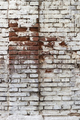 Brick wall painted in white.