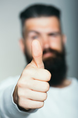 Bearded man with super gesture