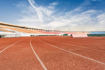 Deurstickers running track and bleachers at the stadium © ABCDstock