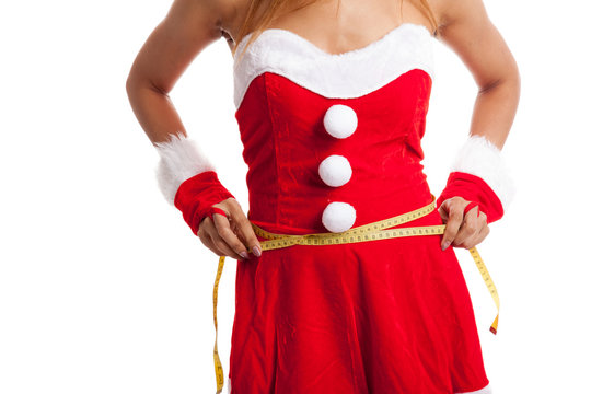 Asian Christmas Girl In Santa Claus Clothes Diet With  Measuring