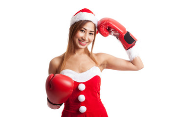 Asian Christmas girl with Santa Claus clothes and  boxing glove