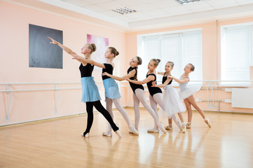 Fototapeta premium Young dancers at ballet class 