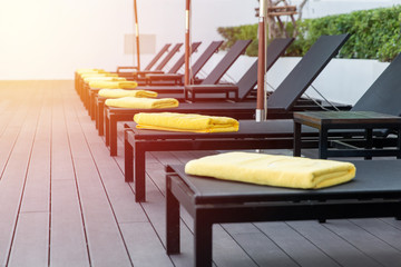 Sunbed un swimming pool area.