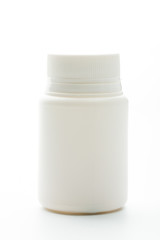 White plastic pill bottles on white background