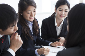 Four businessman who is in the meeting at the office