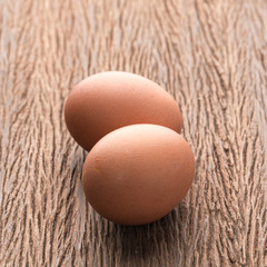 Fresh eggs on wood table
